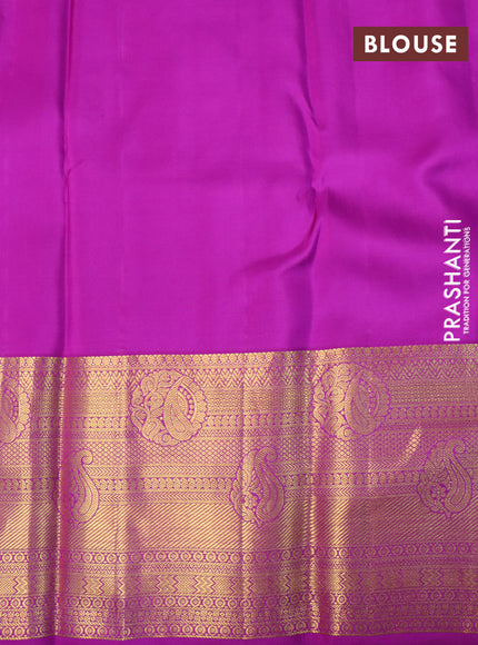 Pure kanchipuram silk saree light pink and purple with allover zari woven floral brocade weaves and long rich zari woven border