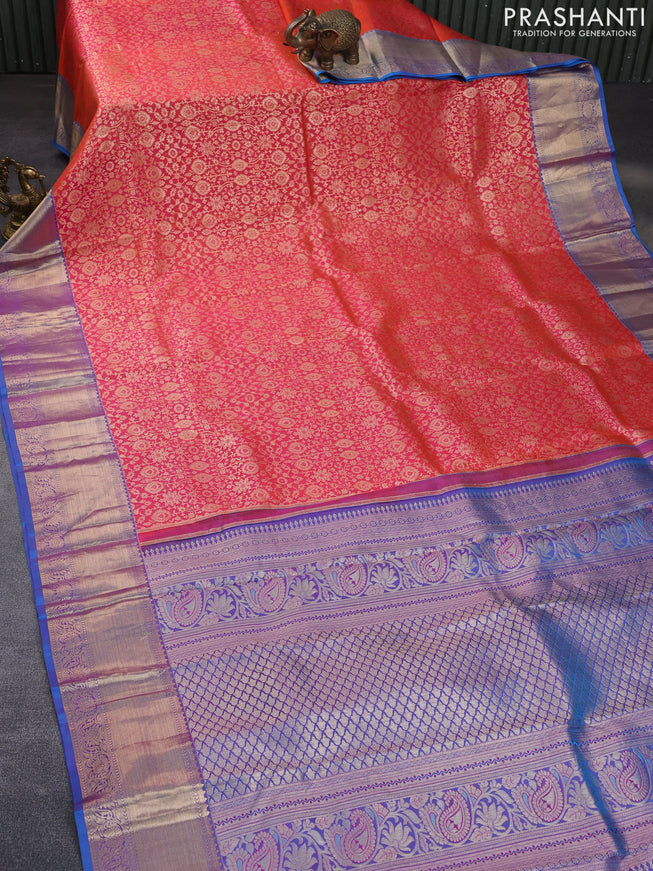 Pure kanchipuram silk saree dual shade of pinkish orange and dual shade of bluish pink with allover zari woven brocade weaves and rich zari woven border