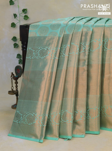 Pure kanchipuram silk saree green shade with allover zari woven butta weaves and long rich zari woven border