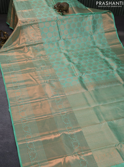 Pure kanchipuram silk saree green shade with allover zari woven butta weaves and long rich zari woven border