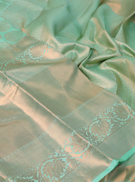 Pure kanchipuram silk saree green shade with allover zari woven butta weaves and long rich zari woven border