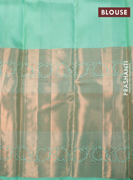 Pure kanchipuram silk saree green shade with allover zari woven butta weaves and long rich zari woven border