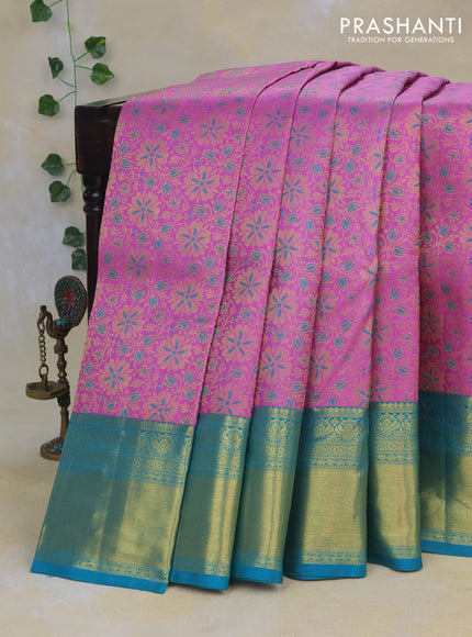 Pure kanchipuram silk saree lotus pink and teal blue with allover zari woven floral brocade weaves and rich zari woven border