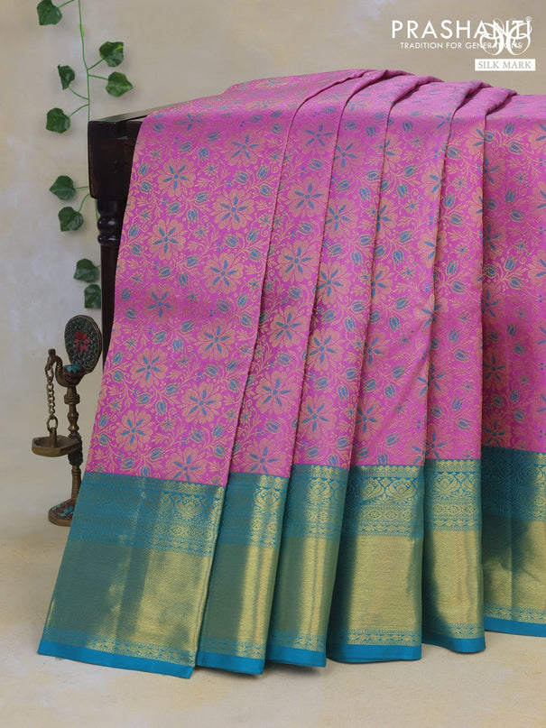 Pure kanchipuram silk saree lotus pink and teal blue with allover zari woven floral brocade weaves and rich zari woven border