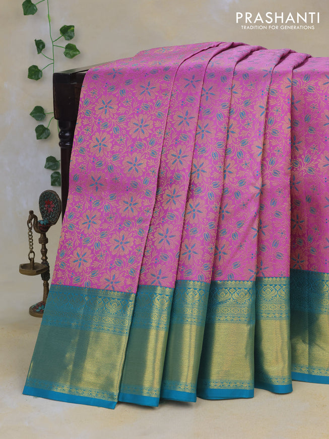 Pure kanchipuram silk saree lotus pink and teal blue with allover zari woven floral brocade weaves and rich zari woven border