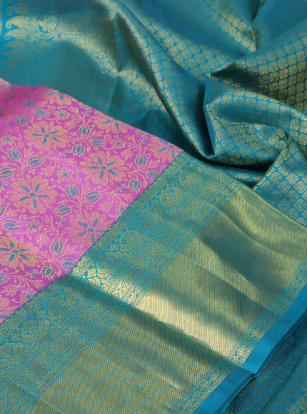 Pure kanchipuram silk saree lotus pink and teal blue with allover zari woven floral brocade weaves and rich zari woven border