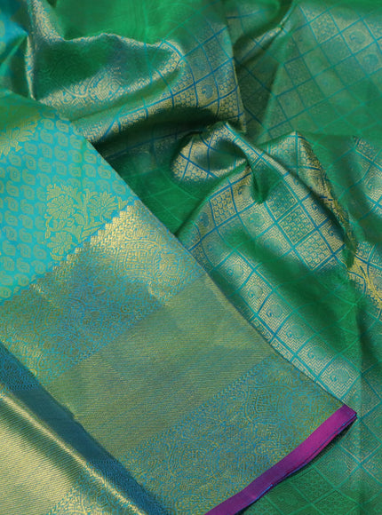 Pure kanchipuram silk saree dual shade of teal green and magenta pink with allover thread woven brocade weaves and rich zari woven border