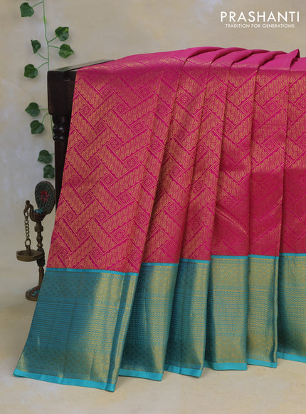 Pure kanchipuram silk saree magenta pink and teal blue with allover zari woven brocade weaves and rich zari woven border