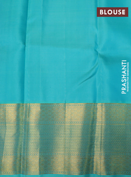 Pure kanchipuram silk saree magenta pink and teal blue with allover zari woven brocade weaves and rich zari woven border