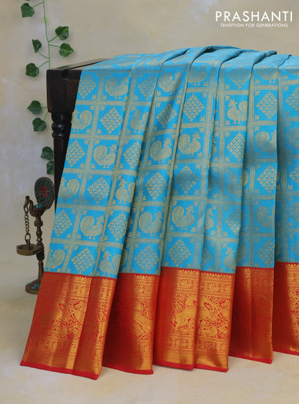 Pure kanchipuram silk saree light blue and red with allover zari woven brocade weaves and rich zari woven border