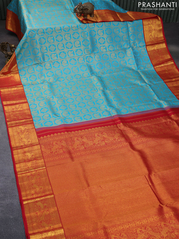 Pure kanchipuram silk saree light blue and red with allover zari woven brocade weaves and rich zari woven border