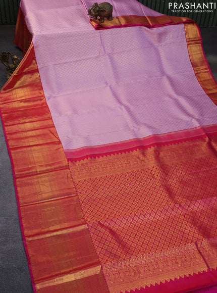 Pure kanchipuram silk saree mild lavender and pink with allover zari woven brocade weaves and long rich zari woven border