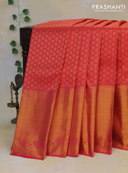 Pure kanchipuram silk saree dual shade of pinkish orange with allover zari woven brocade weaves and long rich zari woven border