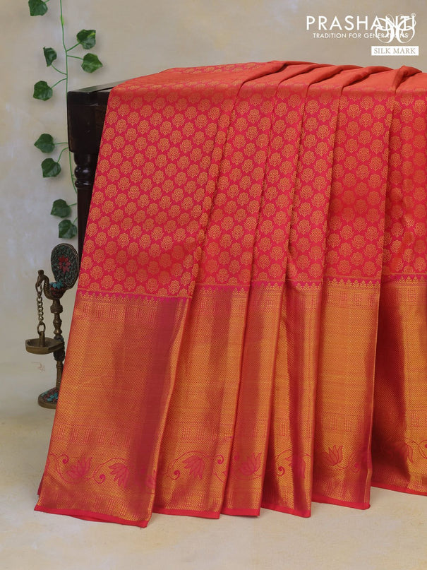 Pure kanchipuram silk saree dual shade of pinkish orange with allover zari woven brocade weaves and long rich zari woven border