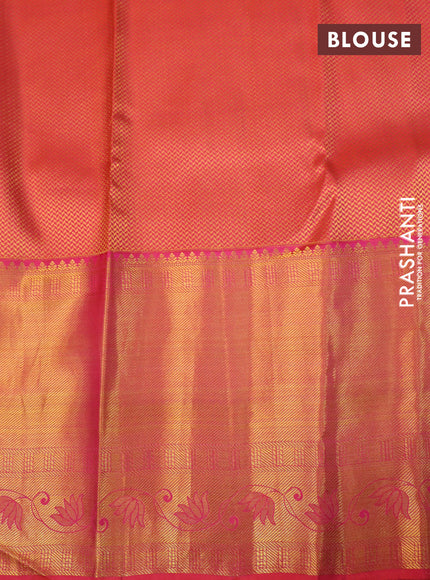 Pure kanchipuram silk saree dual shade of pinkish orange with allover zari woven brocade weaves and long rich zari woven border