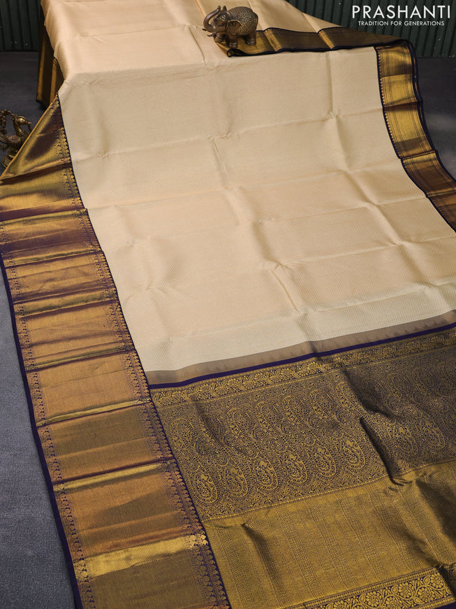 Pure kanchipuram silk saree cream and dark blue with allover zari woven brocade weaves and long rich zari woven border