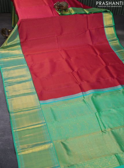 Pure kanchipuram silk saree pink and dual shade of teal bluish green with allover zari woven brocade weaves and long rich zari woven border