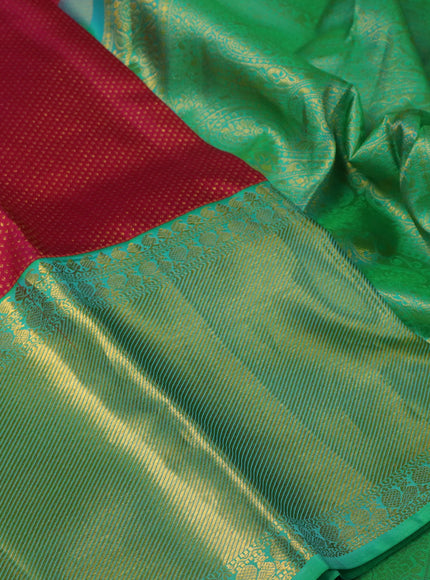 Pure kanchipuram silk saree pink and dual shade of teal bluish green with allover zari woven brocade weaves and long rich zari woven border