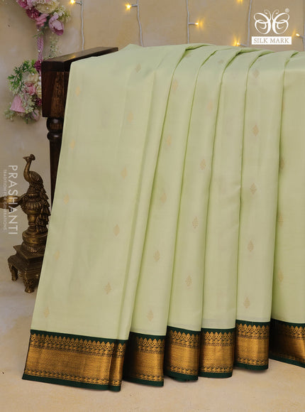 Pure kanchipuram silk saree pista green and bottle green with zari woven buttas and zari woven korvai border