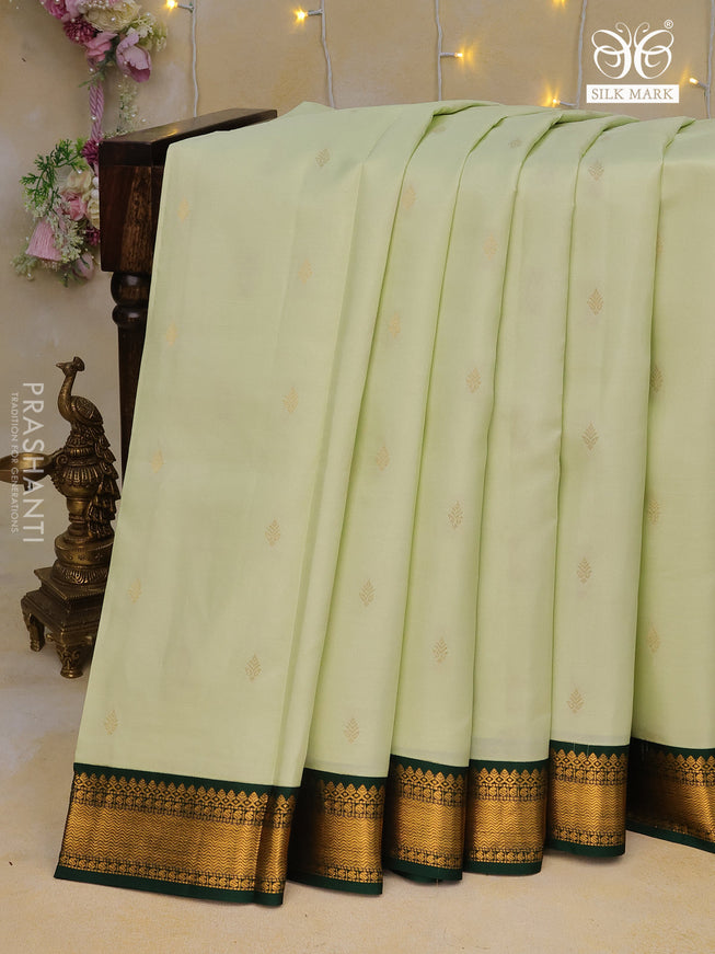 Pure kanchipuram silk saree pista green and bottle green with zari woven buttas and zari woven korvai border