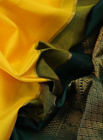 Pure kanchipuram silk saree mango yellow and dark green with allover zari weaves & buttas and zari woven korvai border