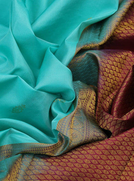 Pure kanchipuram silk saree teal blue and wine shade with zari woven buttas and zari woven korvai border