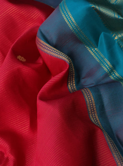 Pure kanchipuram silk saree dark pink and teal green with allover zari weaves & buttas and zari woven korvai border