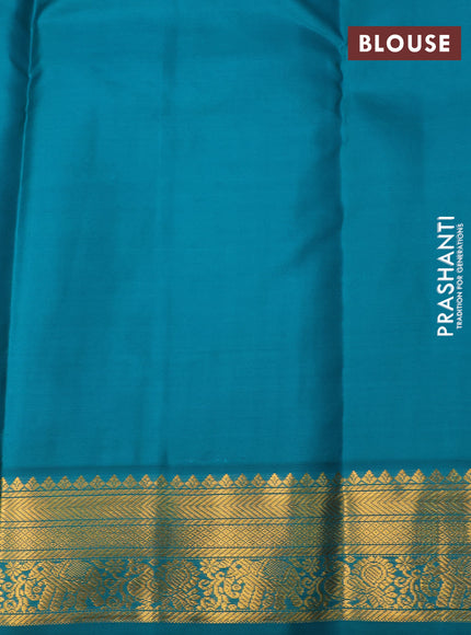 Pure kanchipuram silk saree dark pink and teal green with allover zari weaves & buttas and zari woven korvai border