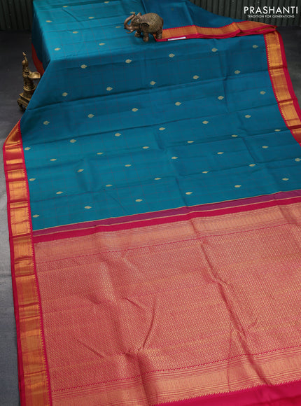 Pure kanchipuram silk saree teal green shade and pink with allover checks & zari buttas and zari woven korvai border