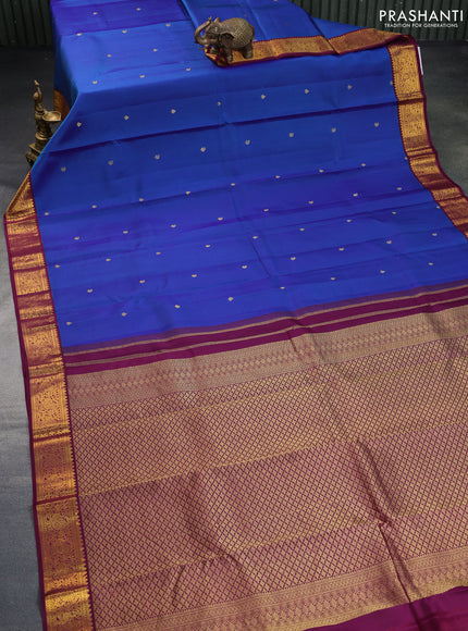 Pure kanchipuram silk saree dual shade of blue and wine shade with zari woven buttas and zari woven korvai border