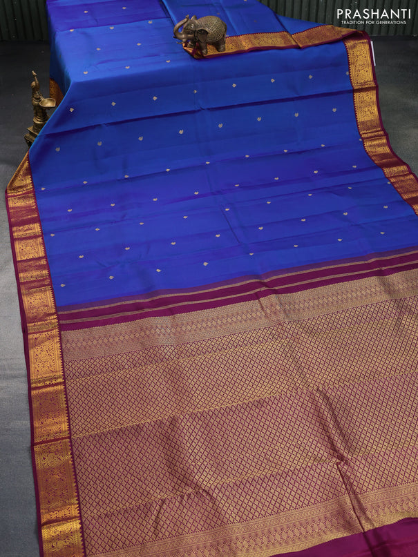 Pure kanchipuram silk saree dual shade of blue and wine shade with zari woven buttas and zari woven korvai border