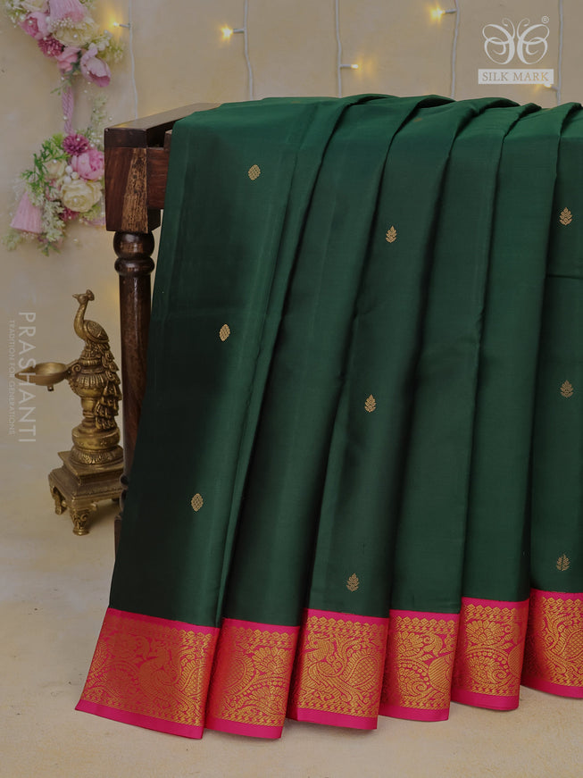 Pure kanchipuram silk saree bottle green and pink with zari woven buttas and zari woven korvai border