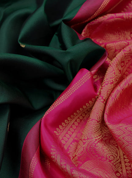 Pure kanchipuram silk saree bottle green and pink with zari woven buttas and zari woven korvai border