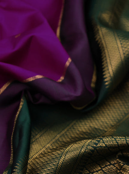 Pure kanchipuram silk saree purple and dark green with zari woven buttas and zari woven korvai border