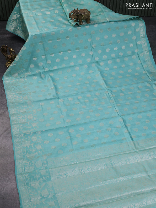 Chiniya silk saree pastel blue shade with allover zari woven buttas and silver zari woven border