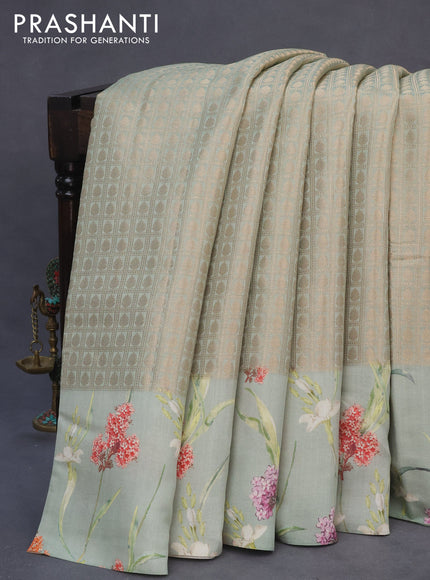 Banarasi silk saree pastel green with allover zari woven brocade weaves and floral digital printed border