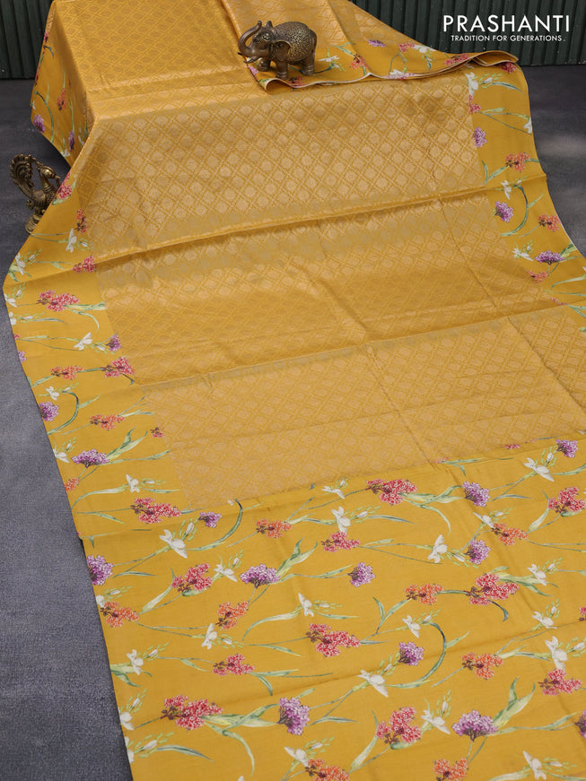 Banarasi silk saree mustard yellow with allover zari woven brocade weaves and floral digital printed border