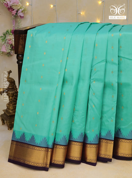 Pure kanchipuram silk saree teal blue and deep violet with allover zari woven buttas and temple design zari woven border