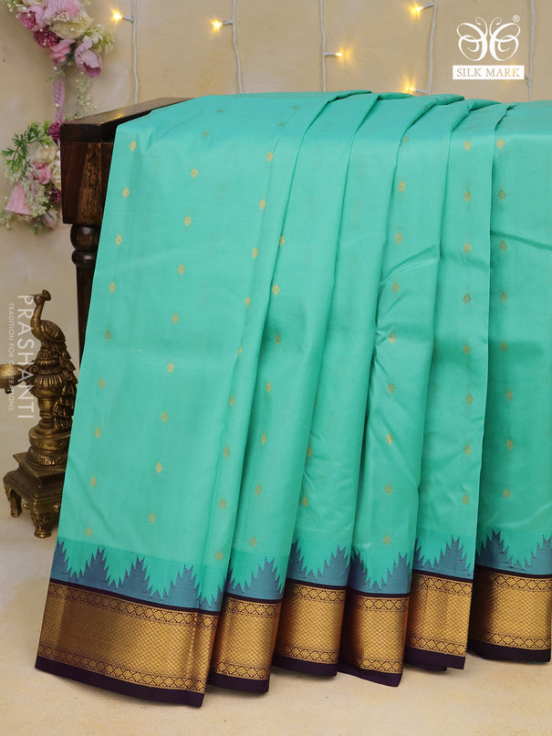 Pure kanchipuram silk saree teal blue and deep violet with allover zari woven buttas and temple design zari woven border