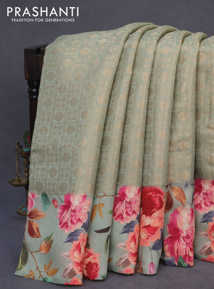 Banarasi silk saree pastel green with allover zari woven brocade weaves and floral digital printed border