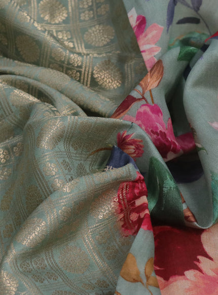 Banarasi silk saree pastel green with allover zari woven brocade weaves and floral digital printed border