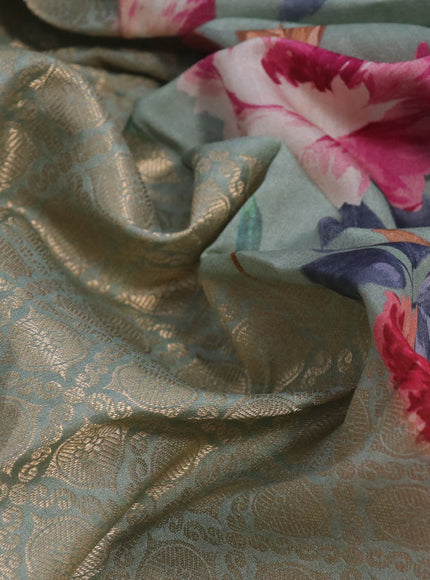 Banarasi silk saree pastel green with allover zari woven brocade weaves and floral digital printed border