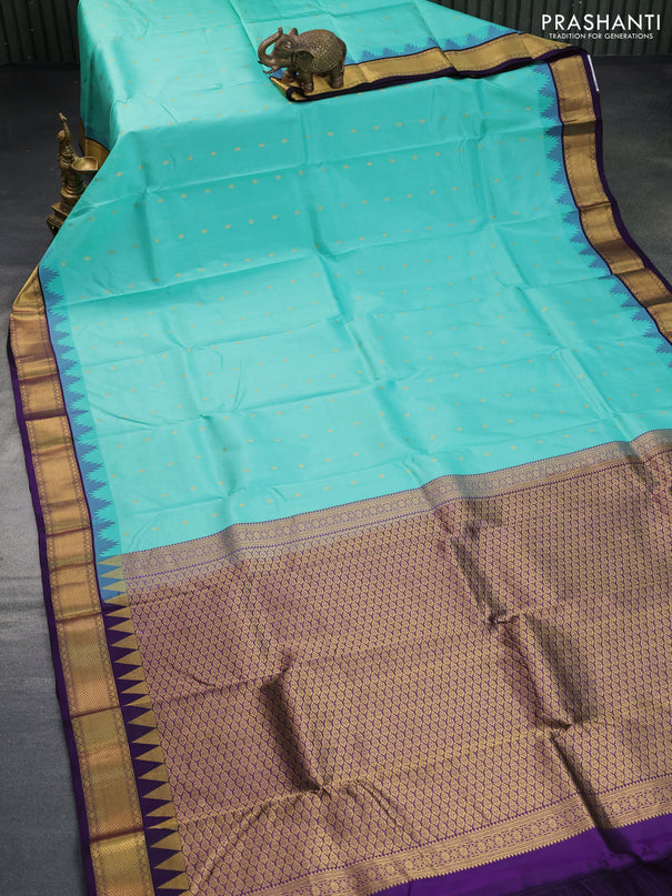 Pure kanchipuram silk saree teal blue and deep violet with allover zari woven buttas and temple design zari woven border