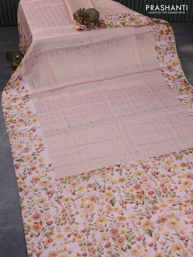 Banarasi silk saree peach shade with allover zari woven brocade weaves and floral digital printed border