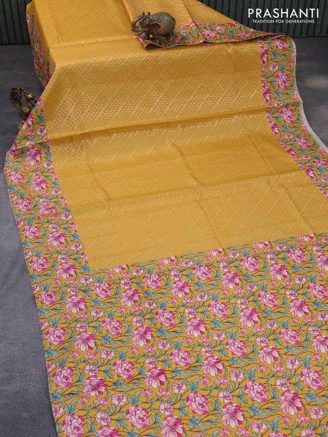 Banarasi silk saree mustard yellow with allover zari woven brocade weaves and floral digital printed border