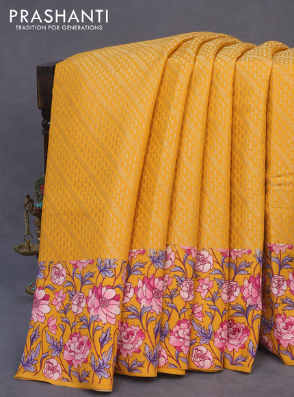 Banarasi silk saree mango yellow with allover zari woven brocade weaves and floral digital printed border