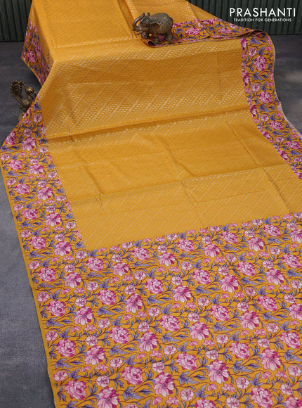 Banarasi silk saree mango yellow with allover zari woven brocade weaves and floral digital printed border