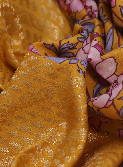 Banarasi silk saree mango yellow with allover zari woven brocade weaves and floral digital printed border