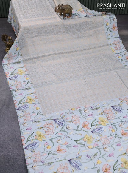 Banarasi silk saree pastel grey with allover zari woven brocade weaves and floral digital printed border