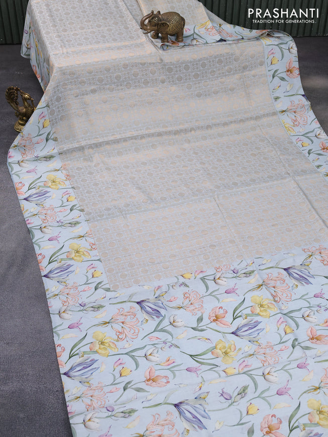 Banarasi silk saree pastel grey with allover zari woven brocade weaves and floral digital printed border